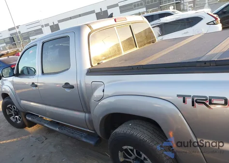 2014 Toyota Tacoma Base V6 z USA, uszkodzony, nr VIN 3TMLU4EN1EM144853